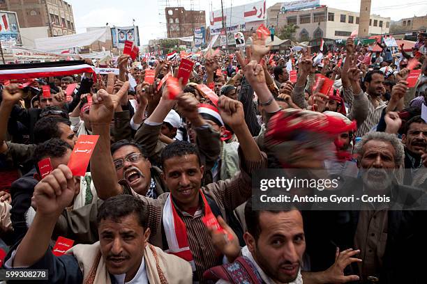 Thousands of People attend a demonstration against President Ali Abdullah Saleh in Sanaa, March 25 as Saleh and top dissident General Ali Mohsen...