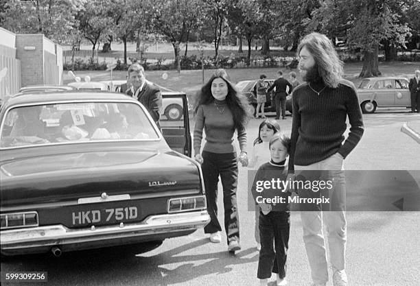 John Lennon and Yoko Ono greeting fans near their home in Surrey before a trip up to Durness, Scotland. Unfortunatley the journey ended 40 miles from...