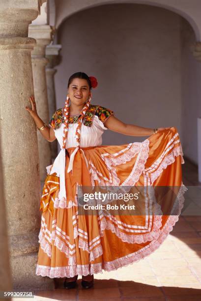 folk dancer in traditional dress - traditional clothing stock pictures, royalty-free photos & images