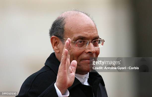President of Tunisia Moncef Marzouki arrives at the Elysee Palace to attend the Summit For Peace And Safety In Africa