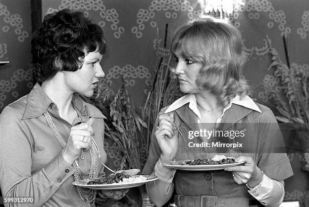 Seen here at the home of Sonia Allison the Daily Mirror cook who prepared a meal for a invited group of celebrities who include Egan Ronay food...