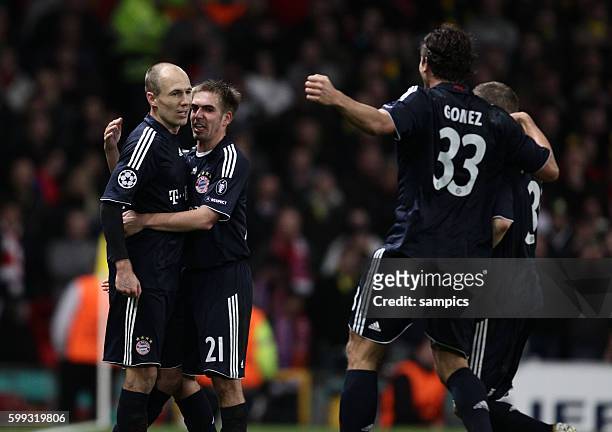 Arjen Robben of Munich celebrates his goal with Phlipp Lahm and Mario Gomez
