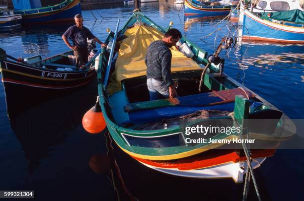 maltese fishing boats - mgarr harbour stock pictures, royalty-free photos & images