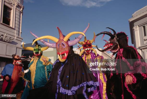 wearing masks at carnival - ponce stock pictures, royalty-free photos & images