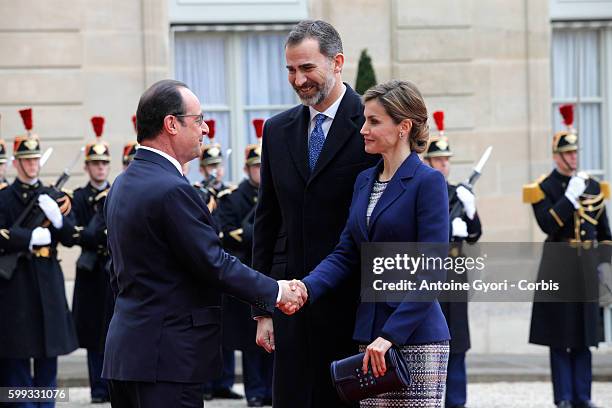 King Felipe and Queen Letizia of Spain are attending a meeting with French President François Hollande at the Elysée Palace