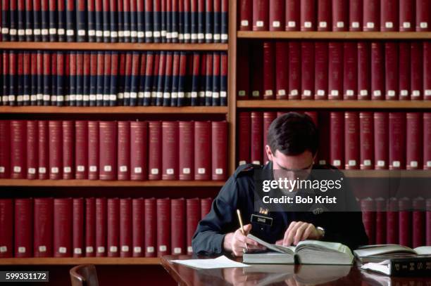 military academy student studying in library - west point military academy stock pictures, royalty-free photos & images