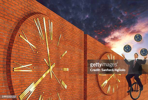 juggling his time - ominous clock stock pictures, royalty-free photos & images