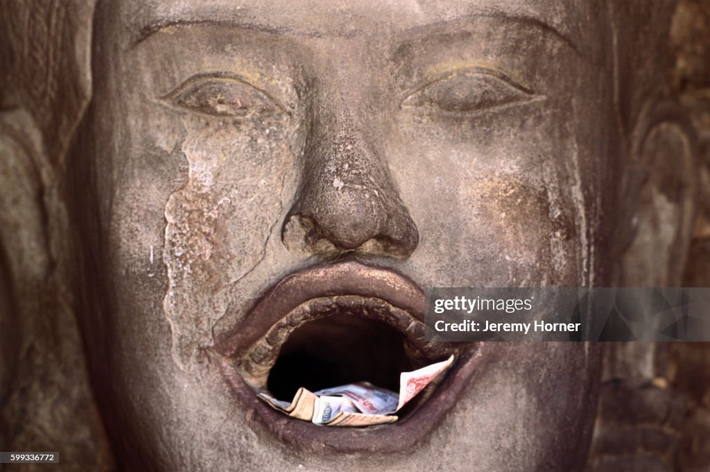 Offerings in Sculpture at Cambodian Temple