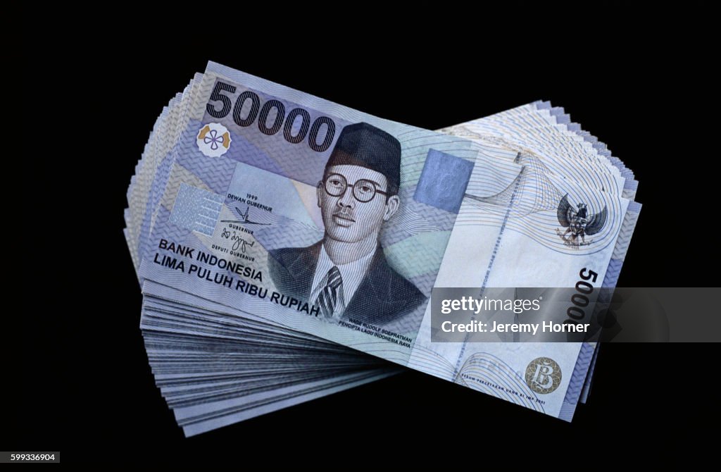 Ind Rupiah Stack Of Indonesian Rupiahs High-Res Stock Photo - Getty Images