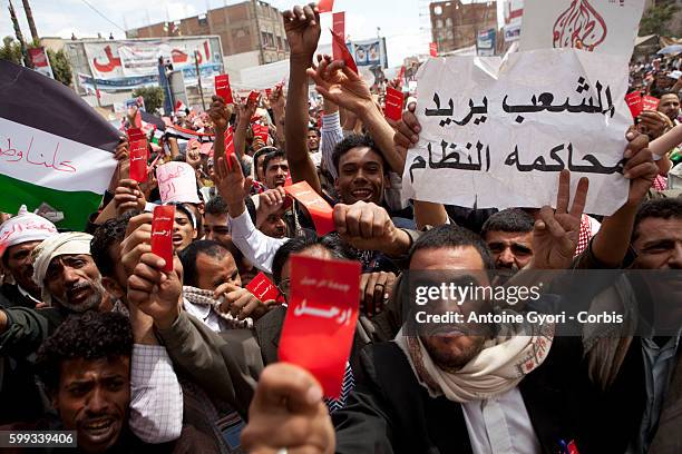 Thousands of People attend a demonstration against President Ali Abdullah Saleh in Sanaa, March 25 as Saleh and top dissident General Ali Mohsen...