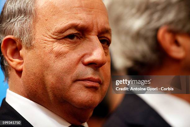 French Foreign minister, Laurent Fabius looks to the media as he arrives for a meeting on the Ukraine crisis on March 5, 2014. In Paris, France.Top...