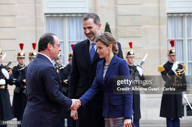 King Felipe and Queen Letizia of Spain are attending a meeting with French President François Hollande at the Elysée Palace