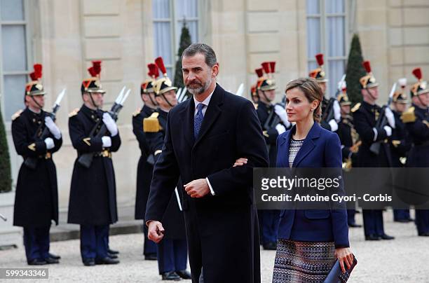 King Felipe and Queen Letizia of Spain are attending a meeting with French President François Hollande at the Elysée Palace