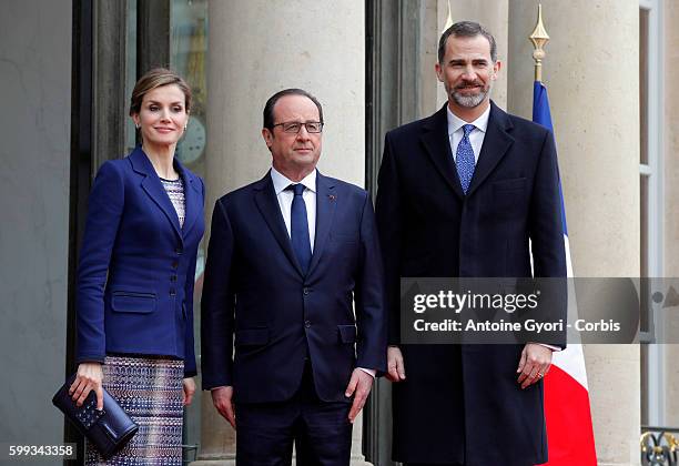 King Felipe and Queen Letizia of Spain are attending a meeting with French President François Hollande at the Elysée Palace