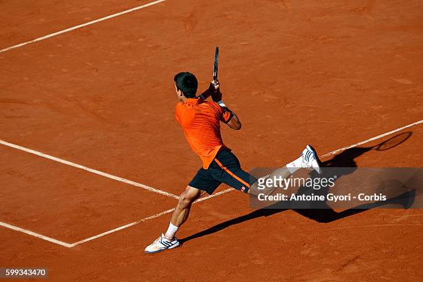 Novak Djokovic of Serbia in the Men's Singles Final against Stanislas Wawrinka of Switzerland on day fifteen of the 2015 French Open at Roland Garros...