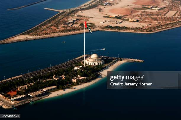 aerial view of abu dhabi coastline - abu dhabi flag stock pictures, royalty-free photos & images