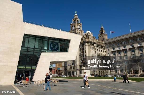 the beatles musem, promenade and the liver building (at rear). liverpool, merseyside, united kingdom - liverpool beatles stock pictures, royalty-free photos & images