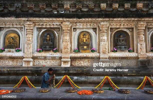 mahabodhi temple adorned with flowers for the tibetan new year - mahabodhi temple stock pictures, royalty-free photos & images