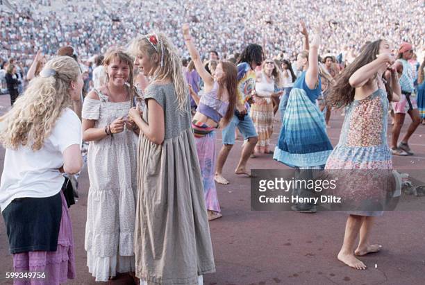 Deadheads, followers of the Grateful Dead, dance at a show in May 1991, Los Angeles, California, USA.