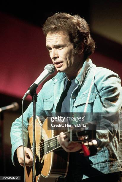 Country music singer and songwriter Merle Haggard performs in concert.