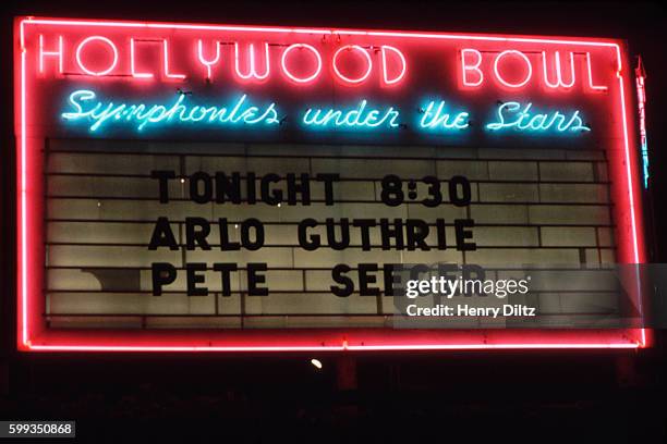 Sign at the Hollywood Bowl advertises a concert featuring folk singers Arlo Guthrie and Pete Seeger.