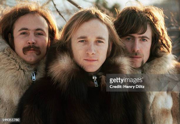 Musicians David Crosby, Stephen Stills, and Graham Nash wearing fur parkas. The group Crosby, Stills, and Nash were formed in the late sixties from...
