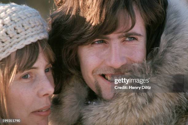 Folk-rock singers Joni Mitchell and Graham Nash wear fur parkas. Crosby, Stills, and Nash often covered songs by and associated with Joni Mitchell....