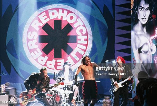 Rock-funk band, Red Hot Chili Peppers perform in concert. Best known for their mix of rock, punk, and funk, the Peppers headlined the Lollapalooza...