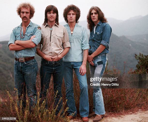 The founding members of The Eagles stand on the edge of Topanga Canyon. | Location: Topanga Canyon, Los Angeles, California, USA.