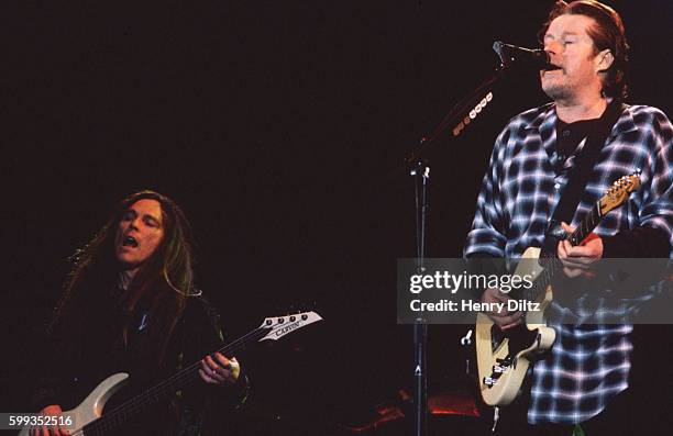 Bass player Timothy B. Schmit and guitarist Don Henley play with The Eagles on their "Hell Freezes Over" tour of 1995. The Eagles were the most...