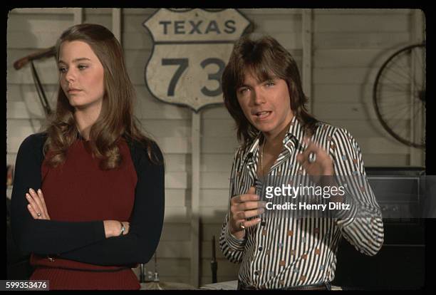 David Cassidy and Susan Dey filming an episode for the television program The Partridge Family.