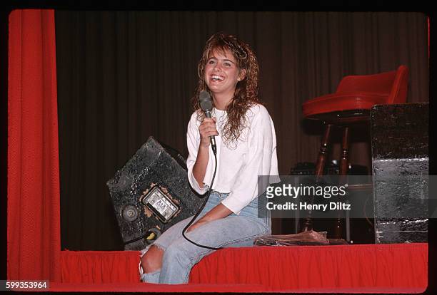 Ami Dolenz, daughter of Mikey Dolenz, talks to fans at a Monkees convention in Chicago.
