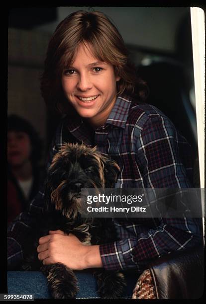 Kristy McNichol Holding a Dog