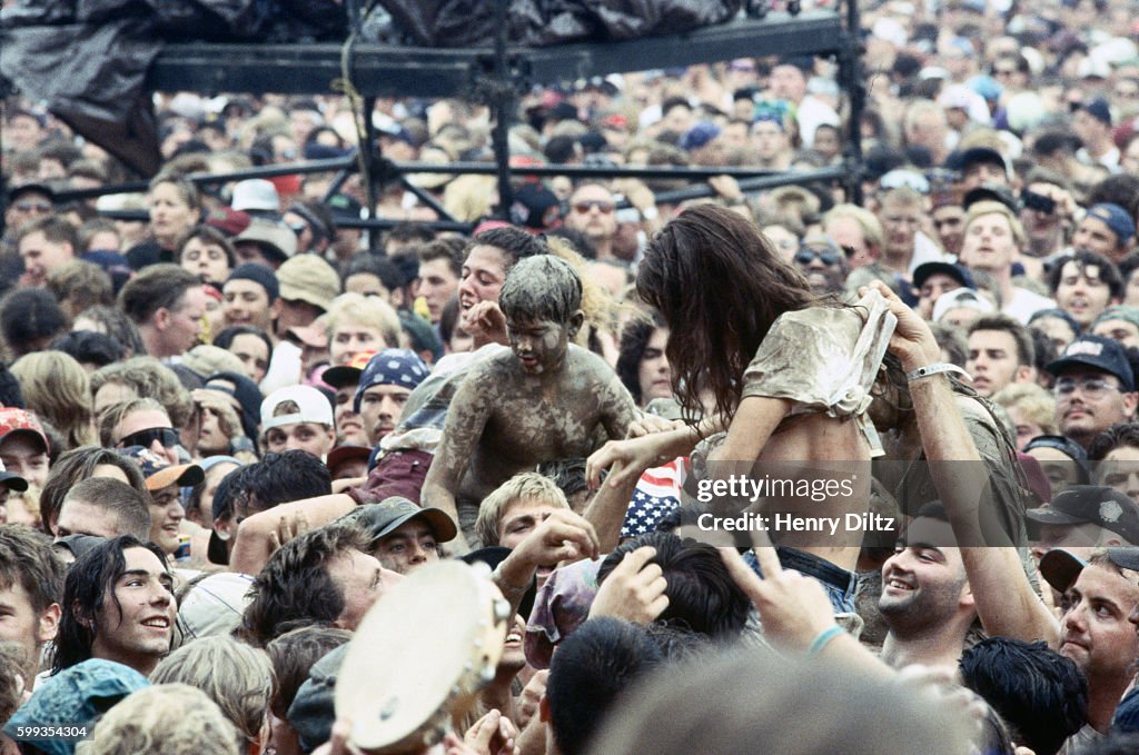 Woman Taking Shirt Off at Woodstock '94