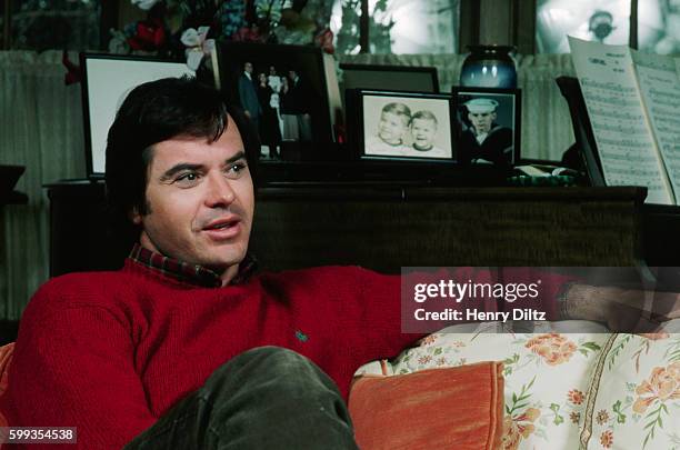 Robert Urich Talking in His Home. Published in Bravo Magazine.