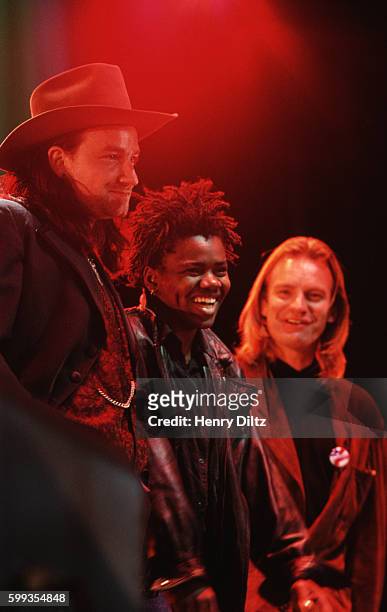 Bono, Tracy Chapman, and Sting at the Los Angeles show of the "Human Rights Now!" World Tour. Bono was a special guest in L.A., Chapman and Sting...