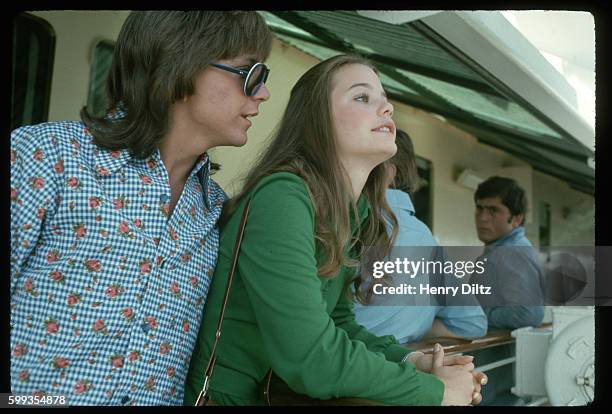 David Cassidy and Susan Dey wait on deck for their call to the set on the Fairseas cruise ship where they are filming of an episode of "The Partridge...