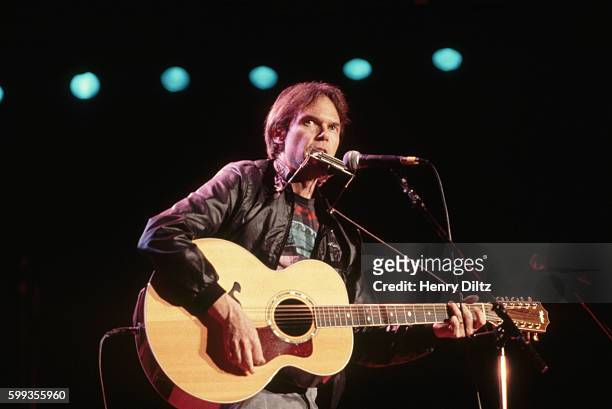 Neil Young performs at a veterans benefit concert at Los Angeles' Shrine Civic Auditorium.