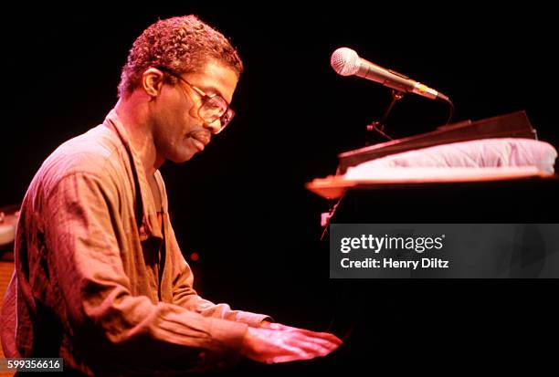 Jazz musician Herbie Hancock plays piano at a Veterans' Benefit.