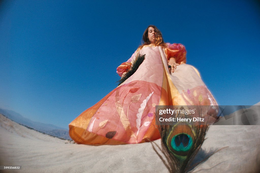 Mama Cass in the Desert with Peacock Feather