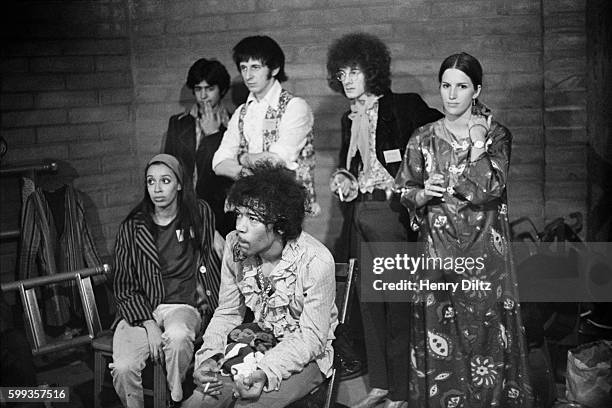 Backstage at the Monterey Pop Festival, where both the Jimi Hendrix Experience and The Who played. Center are Jimi Hendrix , and, behind him, John...