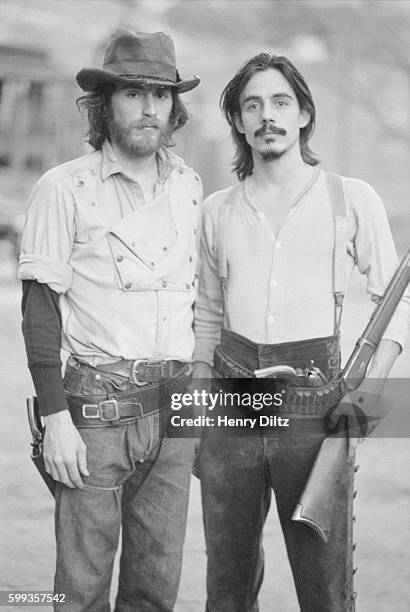 Musicians J.D. Souther and Jackson Browne are dressed as outlaws during a photo shoot for the Eagles' Desperado album.