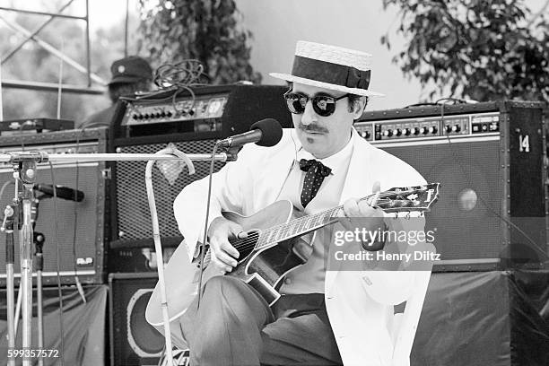 Musician Leon Redbone plays his guitar at the Troubadours of Folk Festival on the UCLA campus.