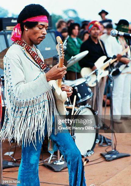 Jimi Hendrix playing his guitar during his set at the Woodstock Music and Art Fair. Playing with Jimi Hendrix is Billy Cox . | Location: Near Bethel,...