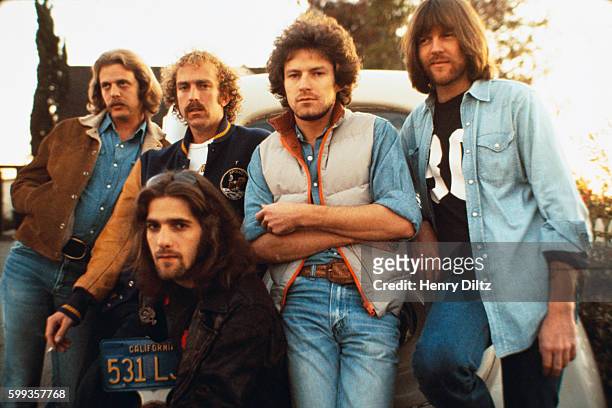 The Eagles are, standing left to right, Don Felder, Bernie Leadon, Don Henley, and Randy Meisner, with guitarist Glenn Frey kneeling.