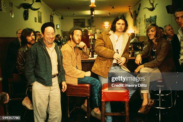 Rock band the Doors barside at the Hard Rock Cafe in Los Angeles. The Doors are : drummer John Densmore, guitarist Robbie Krieger, singer Jim...