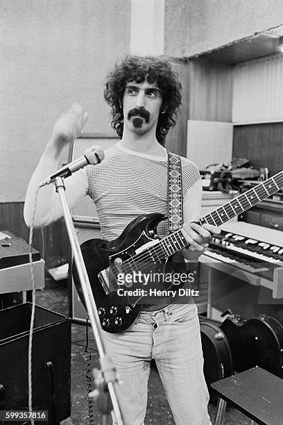 Frank Zappa, composer and guitarist for the band Mothers of Invention, in a recording studio.