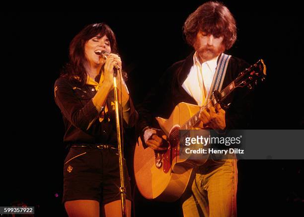 Linda Ronstadt sings alongside J.D. Souther during a concert at the Universal Amphitheater in Los Angeles.