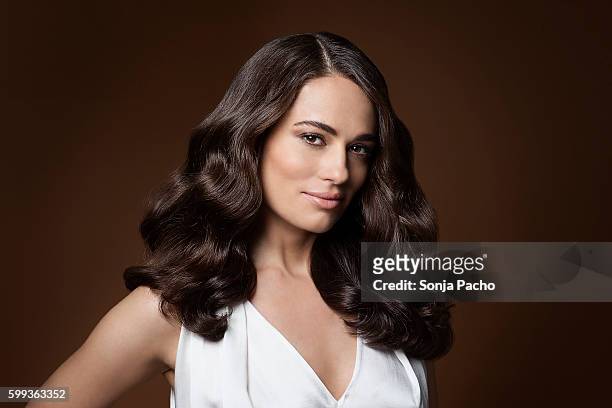 portrait of beautiful woman with long brunette hair - hair brunette imagens e fotografias de stock