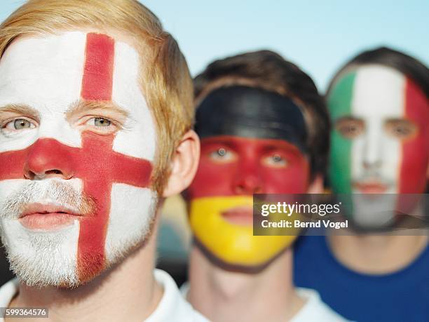 british, german and italian sports fans - tinta facial imagens e fotografias de stock